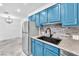 Well-lit kitchen with stainless steel appliances and modern fixtures at 2606 S Durango Dr # 287, Las Vegas, NV 89117