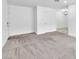 Spacious living room with new carpet and neutral walls at 2606 S Durango Dr # 287, Las Vegas, NV 89117