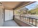 Covered patio with a metal railing and exterior entrance at 2606 S Durango Dr # 287, Las Vegas, NV 89117