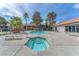 Community pool and spa area with lounge chairs, offering residents a resort-style experience at 2606 S Durango Dr # 287, Las Vegas, NV 89117