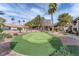Community putting green surrounded by lush landscaping provides recreational opportunities at 2606 S Durango Dr # 287, Las Vegas, NV 89117