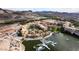 Stunning aerial view of resort community situated on the lake, featuring a boat dock at 30 Strada Di Villaggio # 409, Henderson, NV 89011