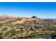 Picturesque aerial shot of golf course community nestled within a stunning desert landscape at 30 Strada Di Villaggio # 409, Henderson, NV 89011