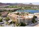 Scenic aerial view of a resort-style community situated on the lake with terracotta roofs at 30 Strada Di Villaggio # 409, Henderson, NV 89011