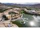 Picturesque aerial view of waterfront resort community with boat dock and surrounding scenery at 30 Strada Di Villaggio # 409, Henderson, NV 89011