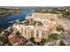Aerial view of lakeside resort community with terracotta rooftops and construction nearby at 30 Strada Di Villaggio # 409, Henderson, NV 89011