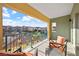 Spacious balcony boasts comfortable seating and beautiful views of the neighborhood at 30 Strada Di Villaggio # 409, Henderson, NV 89011