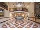 Elegant lobby features soaring ceilings, second-floor balcony, and sophisticated decor at 30 Strada Di Villaggio # 409, Henderson, NV 89011
