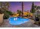 Inviting backyard featuring a private pool, hot tub, and outdoor dining area under decorative string lights at 3024 Half Shell Way, Las Vegas, NV 89128