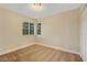 Bedroom features neutral walls, carpeting, and a window with blinds at 3024 Half Shell Way, Las Vegas, NV 89128