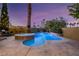 Backyard pool and spa with string lights and lush landscaping create an outdoor oasis at 3024 Half Shell Way, Las Vegas, NV 89128