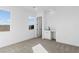 Bright bedroom with a carpet floor, a sink and ample natural light from windows at 311 S Lisbon St, Henderson, NV 89015