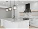 Modern kitchen featuring stainless steel appliances, and a large kitchen island at 311 S Lisbon St, Henderson, NV 89015