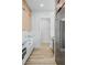 Galley kitchen featuring stainless steel appliances and wooden cabinets at 311 S Lisbon St, Henderson, NV 89015
