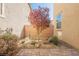 Cozy backyard space with desert landscaping and hardscape pavers at 3158 Teaderman Walk, Henderson, NV 89044