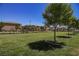 Neighborhood green space with grassy area offers a comfortable place to relax, exercise and enjoy the outdoors at 3158 Teaderman Walk, Henderson, NV 89044