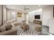 Bright living room with stylish furniture, neutral color palette, and ample natural light at 3158 Teaderman Walk, Henderson, NV 89044