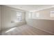 Bright loft area with multiple windows and neutral carpet at 3158 Teaderman Walk, Henderson, NV 89044