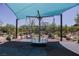 Modern playground with shade structure and fun interactive equipment providing a unique and engaging play experience at 3158 Teaderman Walk, Henderson, NV 89044