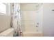 Clean white shower and tub combination with stylish grey and white marble design shower curtain at 3158 Teaderman Walk, Henderson, NV 89044