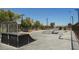 Community skate park featuring ramps, rails, and benches for skating and recreation on a clear day at 3158 Teaderman Walk, Henderson, NV 89044