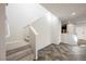 Staircase leading to the second floor with neutral walls and tile floors at 3158 Teaderman Walk, Henderson, NV 89044