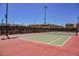 Community tennis court provides an opportunity for residents to engage in friendly competition and active recreation at 3158 Teaderman Walk, Henderson, NV 89044