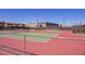 Community tennis courts offering a great way to stay active and socialize with neighbors on a sunny day at 3158 Teaderman Walk, Henderson, NV 89044