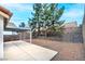 Home's backyard features gravel landscaping, mature trees and covered patio at 3643 Spring Willow Ct, Las Vegas, NV 89147