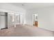 Bright bedroom featuring a large closet with mirrored doors and neutral carpet at 3643 Spring Willow Ct, Las Vegas, NV 89147