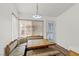 Charming breakfast nook with a built-in bench, wooden table and natural light at 3643 Spring Willow Ct, Las Vegas, NV 89147