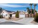 Charming single-story home featuring a red tile roof, solar panels, and a two-car garage at 3643 Spring Willow Ct, Las Vegas, NV 89147