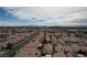 Aerial view of neighborhood featuring desert landscape and distant mountains at 3643 Spring Willow Ct, Las Vegas, NV 89147