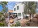 This backyard features a patio, outdoor seating, and low maintenance landscaping at 369 Monique Springs St, Henderson, NV 89014