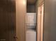 Convenient laundry closet features a stacked washer and dryer unit at 3967 Visby Ln, Las Vegas, NV 89119