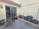 Enclosed patio with sliding glass door, offering a private outdoor space with textured stucco walls at 3967 Visby Ln, Las Vegas, NV 89119