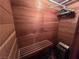 Cozy sauna featuring wood-paneled walls and a traditional stone heater, offering a relaxing retreat at 3967 Visby Ln, Las Vegas, NV 89119