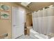 Bathroom featuring a shower with decorative tile surround and a neutral color palette at 4050 Pacific Harbors Dr # 233, Las Vegas, NV 89121