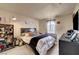 Cozy bedroom with a comfortable bed and plenty of natural light at 4050 Pacific Harbors Dr # 233, Las Vegas, NV 89121