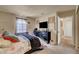 Bright bedroom featuring carpet flooring and plenty of closet space at 4050 Pacific Harbors Dr # 233, Las Vegas, NV 89121