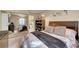 Comfortable bedroom featuring a mirrored closet and view to the en suite bathroom at 4050 Pacific Harbors Dr # 233, Las Vegas, NV 89121