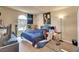 A furnished bedroom with natural light, and ample space at 4050 Pacific Harbors Dr # 233, Las Vegas, NV 89121