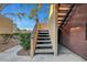 Exterior of a unit showcasing stairs to upper level units at 4050 Pacific Harbors Dr # 233, Las Vegas, NV 89121