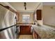 Charming kitchen with stainless steel appliances and granite countertops at 4050 Pacific Harbors Dr # 233, Las Vegas, NV 89121