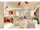Cozy living area with kitchen views, a dining table, and an open-concept design at 4050 Pacific Harbors Dr # 233, Las Vegas, NV 89121