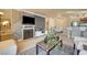 Comfortable living room featuring stylish decor, a cozy fireplace, and plenty of natural light at 4050 Pacific Harbors Dr # 233, Las Vegas, NV 89121