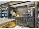 Elegant bar area with a marble countertop, coffee machines, and shelving at 4471 Dean Martin Dr # 2101, Las Vegas, NV 89103