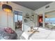Cozy bedroom featuring modern decor, designer lighting, and floor-to-ceiling windows with amazing city views at 4471 Dean Martin Dr # 2101, Las Vegas, NV 89103