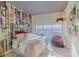 Comfortable bedroom features modern decor, unique wallpaper, and expansive city views at 4471 Dean Martin Dr # 2101, Las Vegas, NV 89103