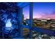 Gorgeous city view from the condo windows showcasing colorful sunset and building lights at dusk at 4471 Dean Martin Dr # 2101, Las Vegas, NV 89103